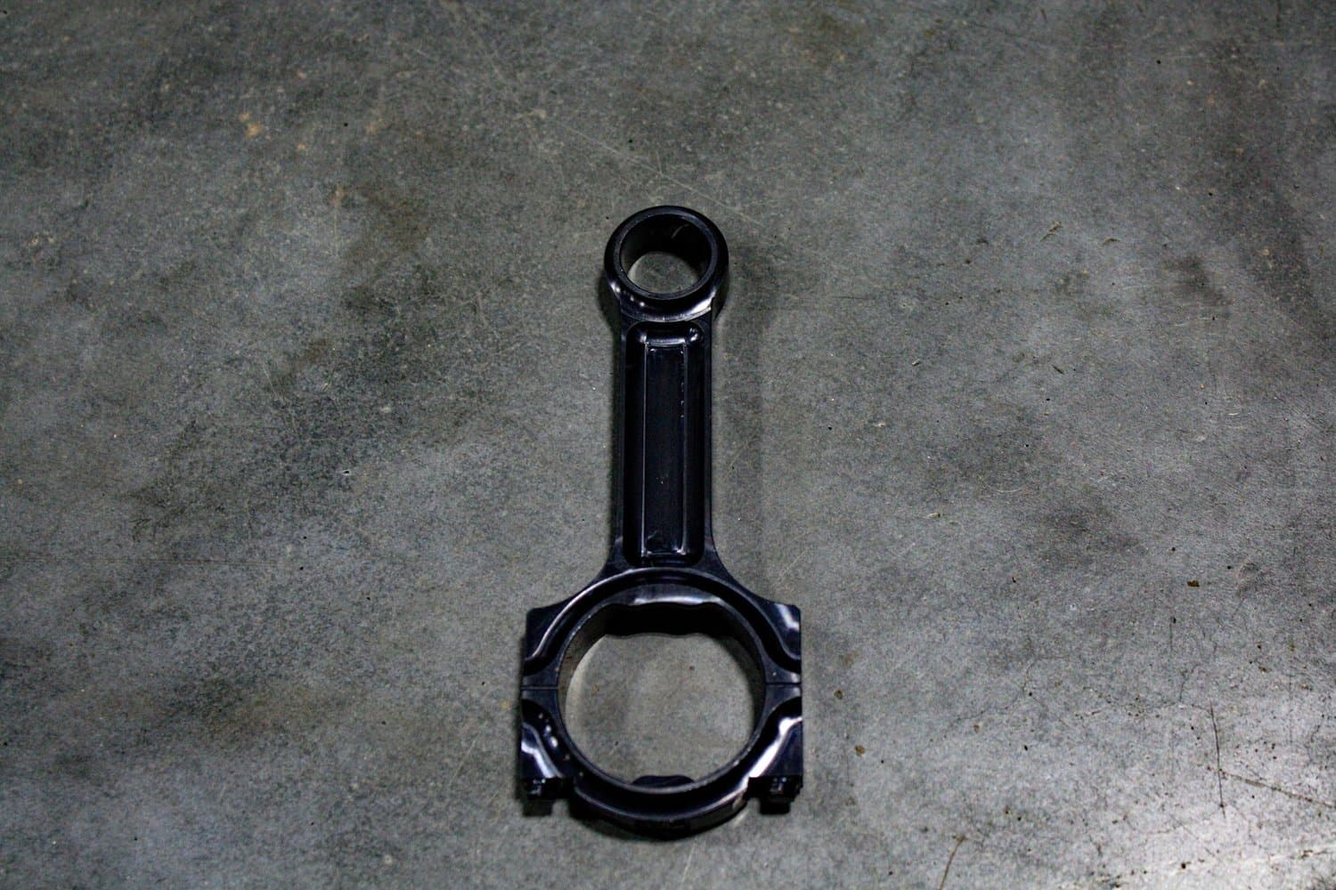 Black anodized billet aluminum bottle opener from Big Chips CNC
